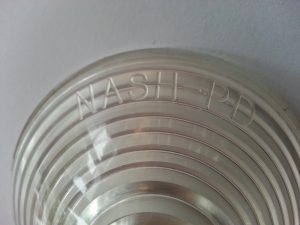 close up Nash Healey reproduction parking light lens